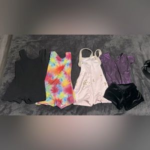4 sets of gymnastics/ tumble size 3-4 outfits.  used but are in great shape